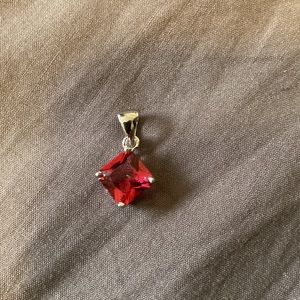 Never used 100% 925 Sterling Silver Pendant with Red Stone